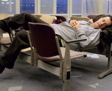 Tom Hanks sleeping in the airport