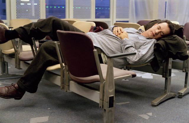 Tom Hanks sleeping in the airport